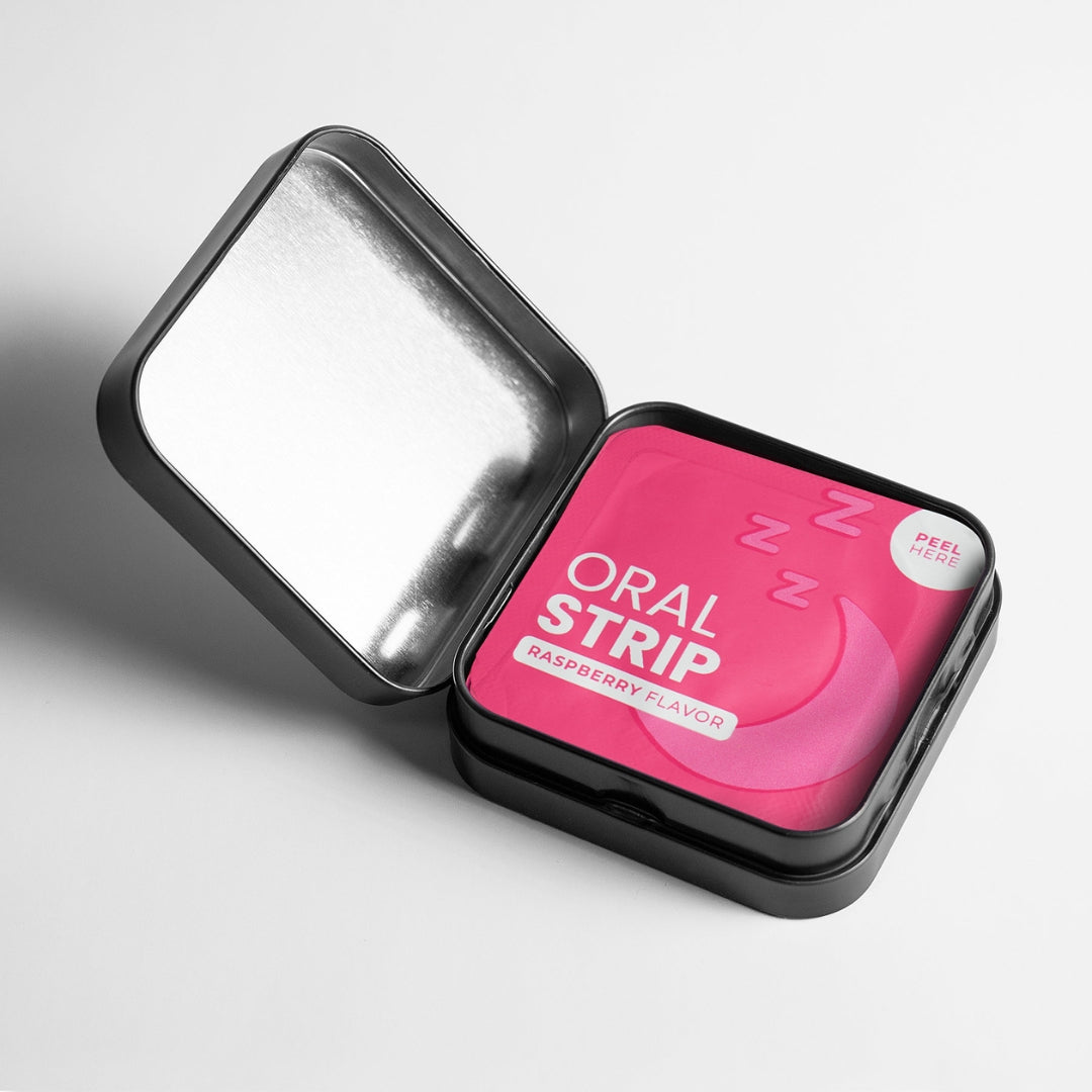 Open tin of CalmWave Strips by Zukra Energy, revealing individual raspberry flavoured oral strips